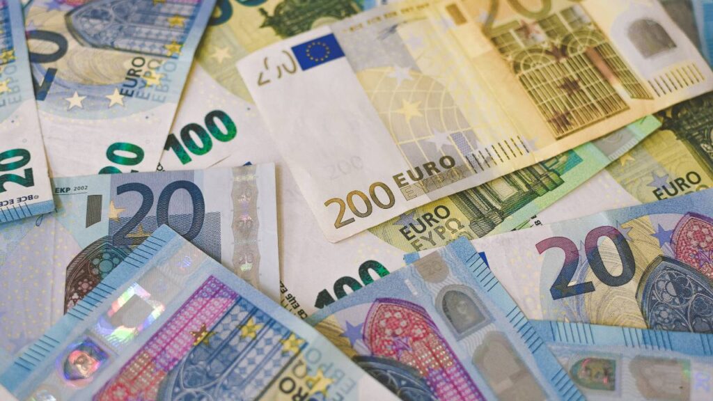 A heap of colourful money bills